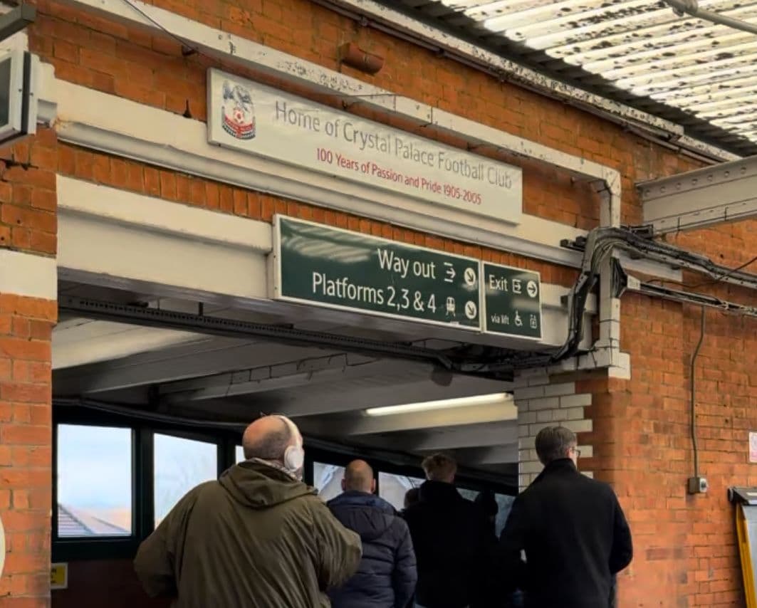 Supporters walking through Selhurst Park station on the way to a Crystal Palace match.