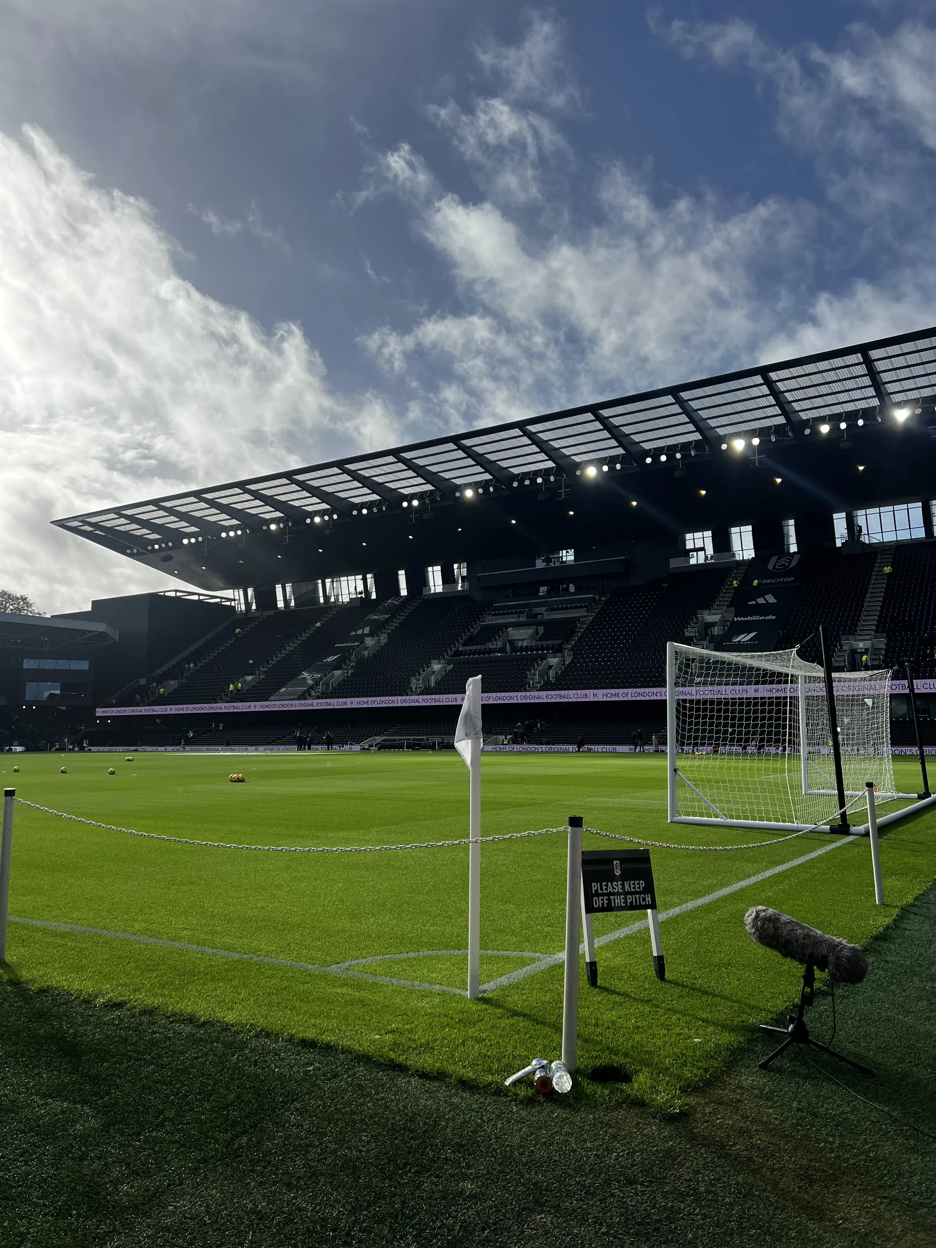 Pitchside view at Craven Cottage with corner flag and goal, home of Fulham FC