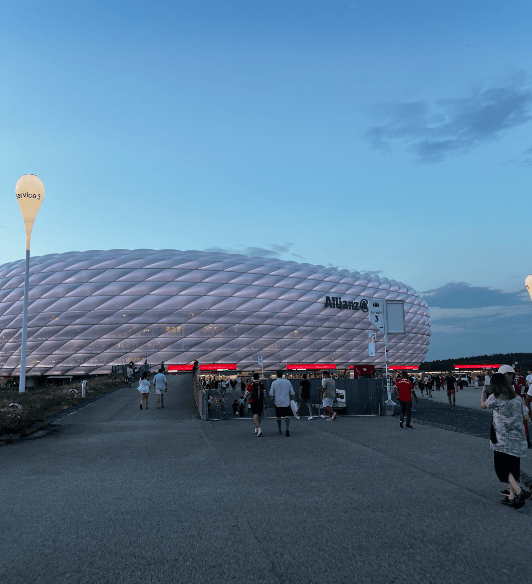 Bayern Munich fans walking toward the Allianz Arena before kickoff