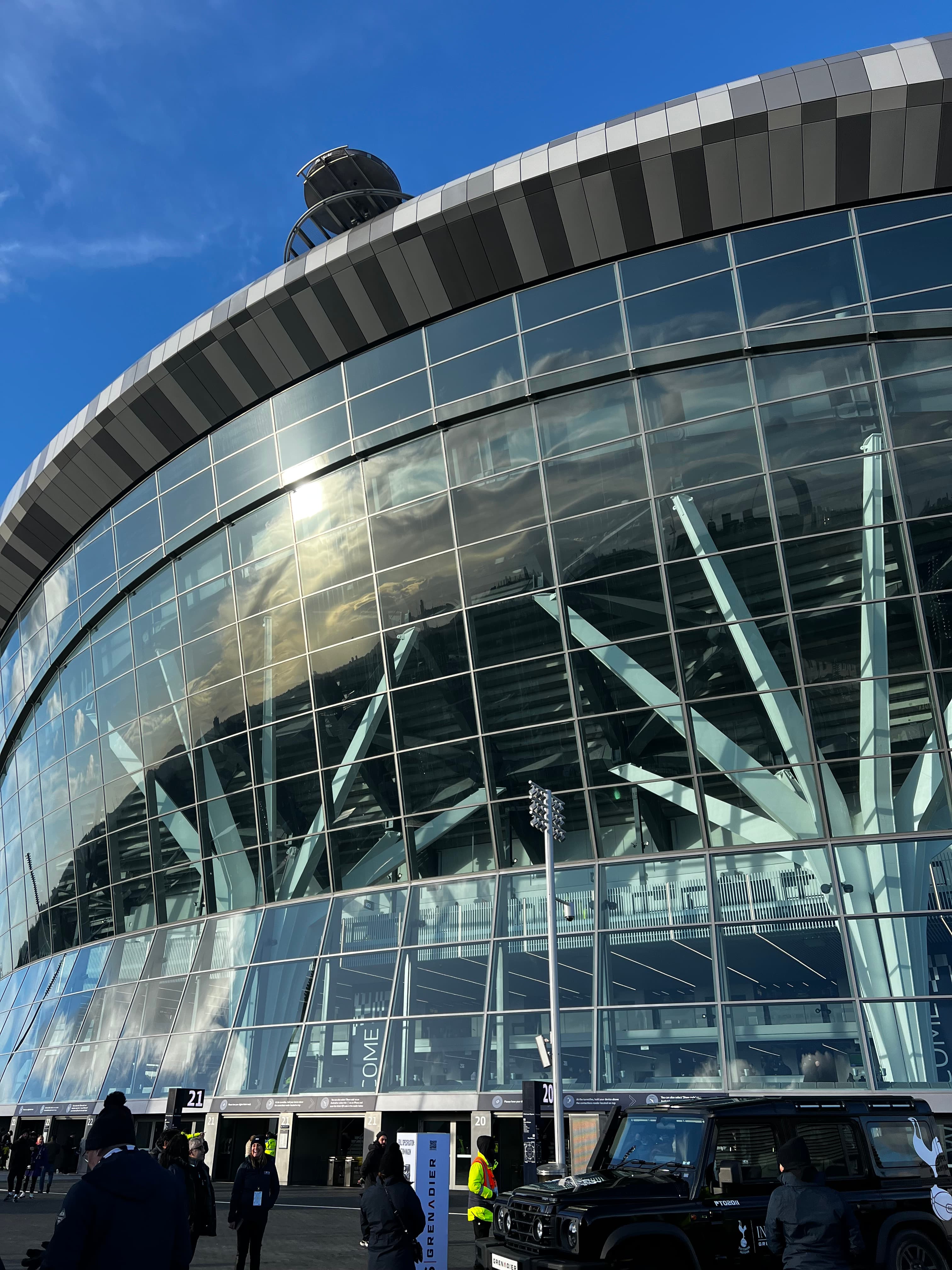 Glass exterior facade of Tottenham Hotspur Stadium in London