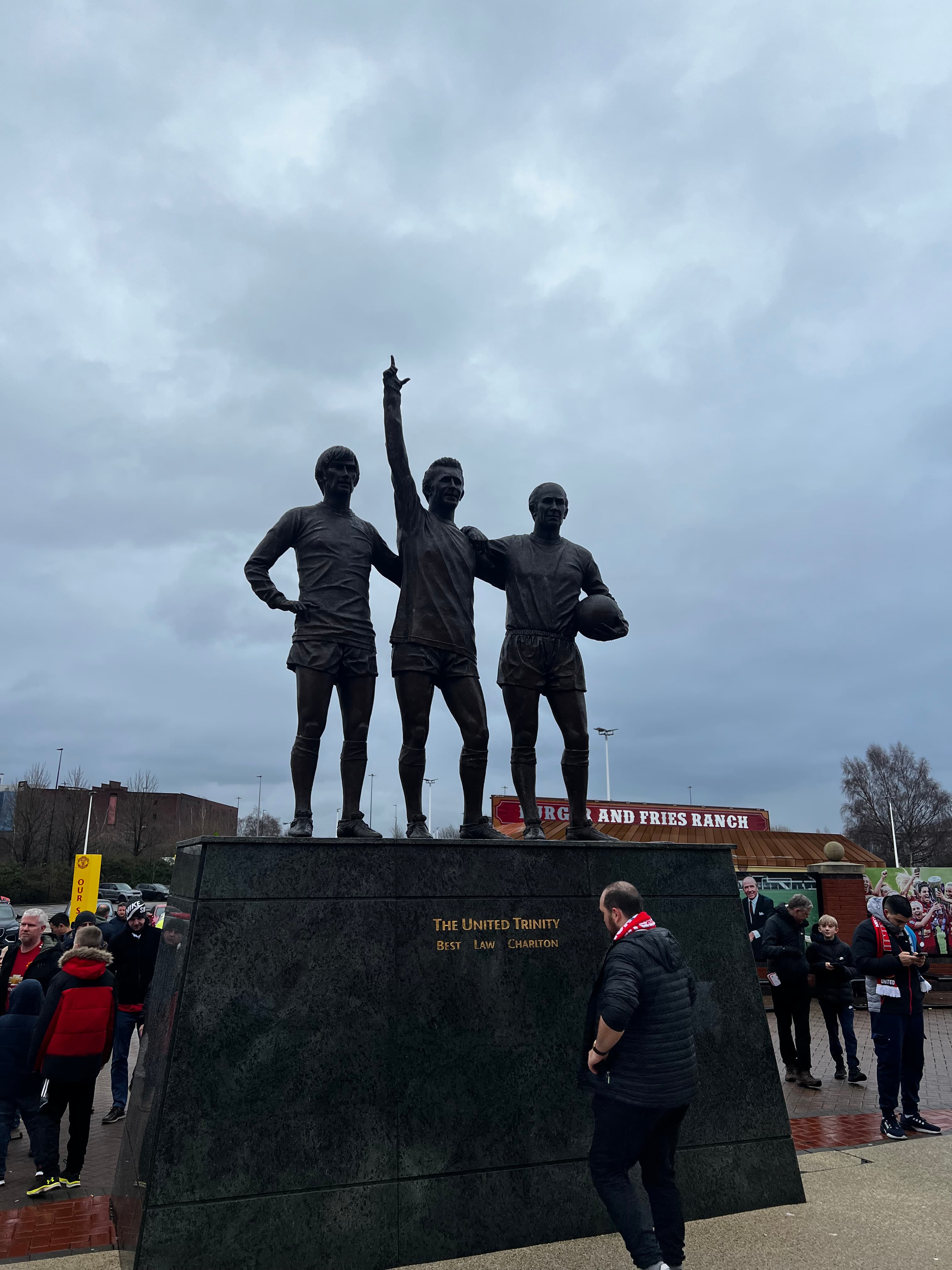 United Trinity statue Old Trafford George Best Denis Law Bobby Charlton Manchester United legends bronze sculpture